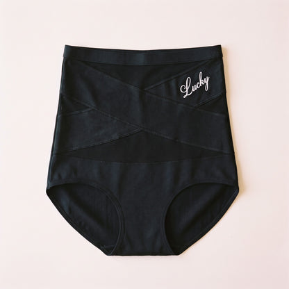 High-waist shaping briefs in black with crossed bands