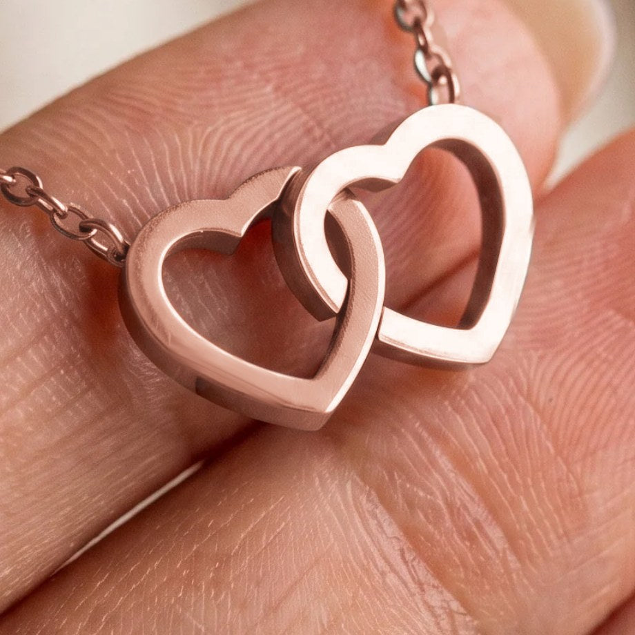 Interlocking hearts necklace in rose gold with your engraving