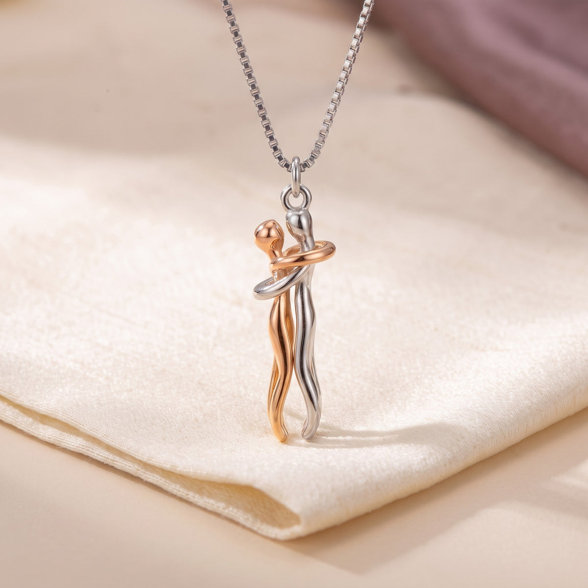 Hug Necklace in rose gold and silver
