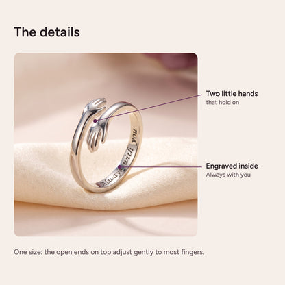 Hug ring details: two little hands and the engraving inside