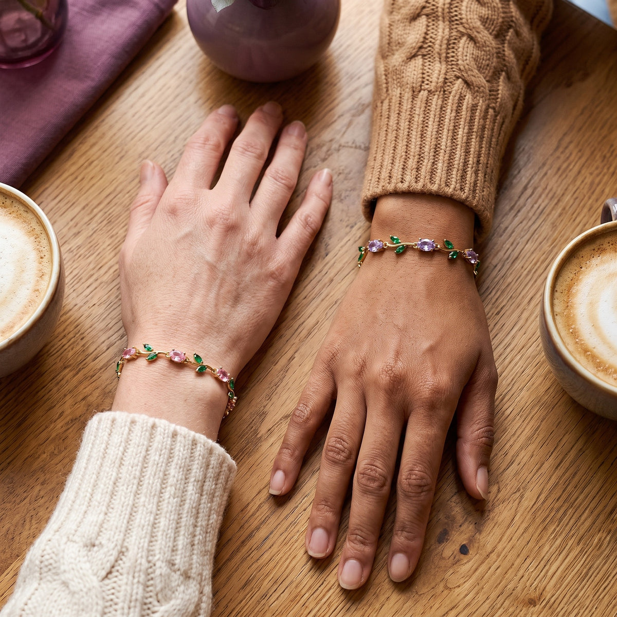 Two friends wearing Tulip Bracelets